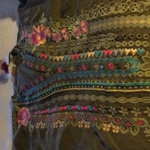 Beautiful embroidery all the way down the front